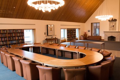 View of the conference table in the Donald E. Petersen Room, located on the 4th floor of the Allen Library, looking N towards round window.