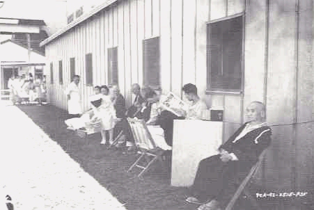 Patients relax in the shade