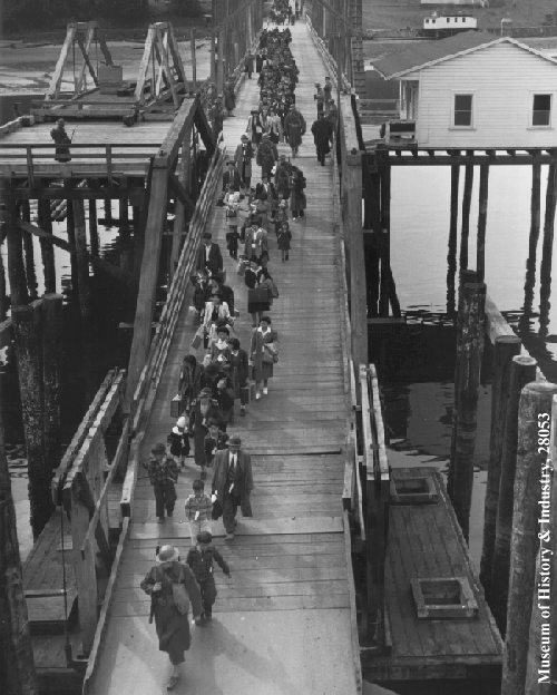 Bainbridge Island evacuees boarding ferry under army guard, PI-28053