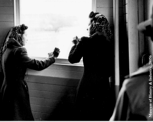 Japanese American women at ferry window, PI-28056